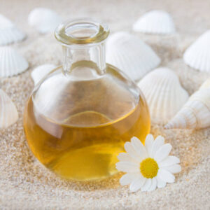 Oil and sand with daisy